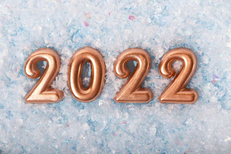 Top view of the rose gold numbers 2022.Festive concept, new year card.の写真素材