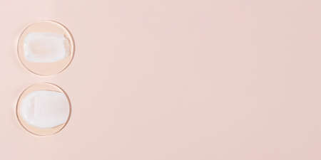 Top view of the cosmetic cream on the acrylic podiums,different swatches.Pastel colors,copy space.Good as cosmetics mockup.Large banner.の写真素材