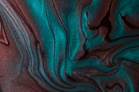Abstract background from shimmer nail lacquer,chocolate and turquoise colors.Horizontal orientation.の写真素材