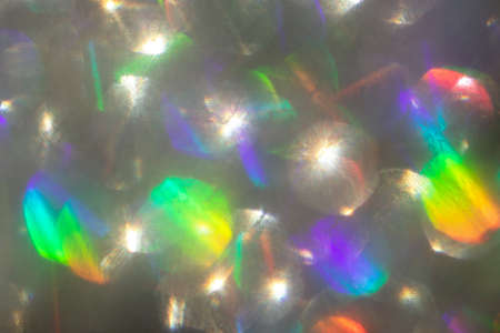Abstract defocused black background with shining glitter.Good as overlay layer.Abstract defocused...