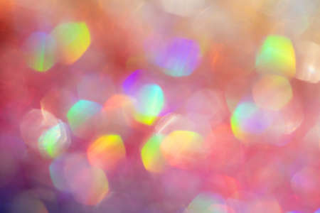 Abstract defocused pink background with shining glitter.Good as overlay layer.の写真素材