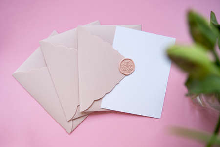 Photography from above of several gift certificates.Tender pink color,springtime holidays.の写真素材