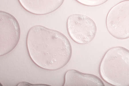 Top view of liquid cosmetics gel with bubbly structure on pastel background.Good as cosmetic mockup.の写真素材