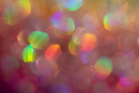 Abstract defocused pink background with shining glitter.Good as overlay layer.の写真素材