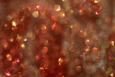 Abstract defocused brown gradient background with shining glitter.Good as overlay layer.の写真素材