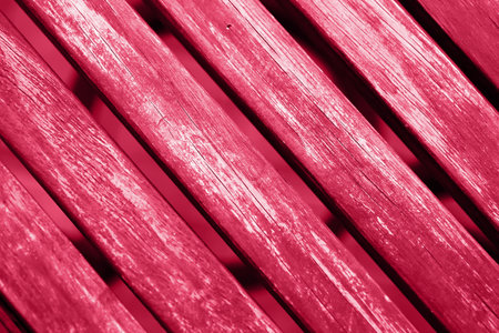 Top view of colored in red wooden beams.の写真素材
