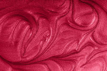Liquid shimmer background,monochrome red color.の写真素材