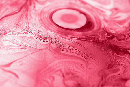 Ebru ornament on water surface,trendy red color.の写真素材