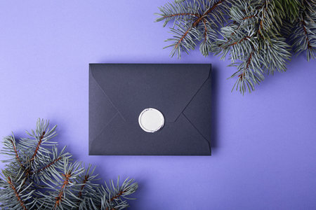 Photography from above of gift certificate with branches of christmas tree around it.の写真素材