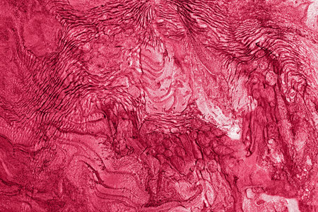 Liquid shimmer crumpled background,monochrome red color.の写真素材