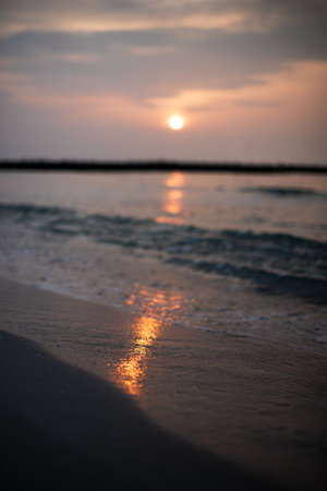Vertical defocused photography of sunrise. Good for text overlay.の写真素材