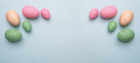 Frame from multicolored eggs on blue background.Easter concept.の写真素材