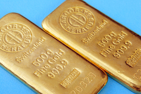 Fine gold of a bank on blue backgroundのeditorial素材