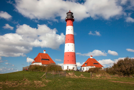 View of famous Westerhever lighthouse at North Sea coast, Germany