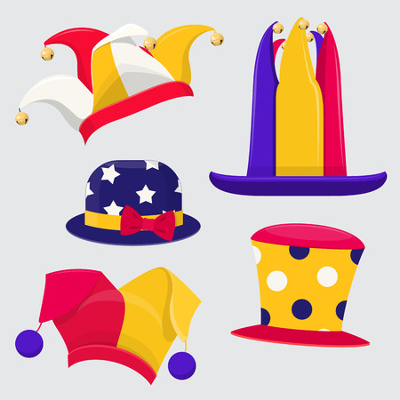 Set of fanny jester hats. Colored jester hats of different shapes.Vector illustration on gray backgroundのイラスト素材