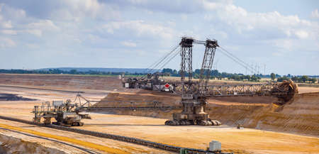 Bucket-wheel excavator. Huge coal mining drill machine in a coal open pit. North Rhine-Westphalia, Germanyの写真素材