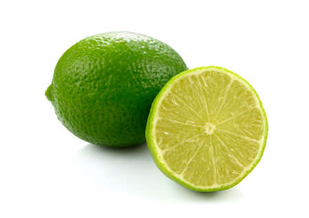 Fresh green lime isolated on white