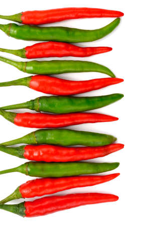 Red-green  hot chilies isolated on whiteの写真素材
