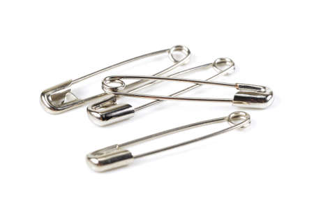 Metal safety pin on white background.の写真素材