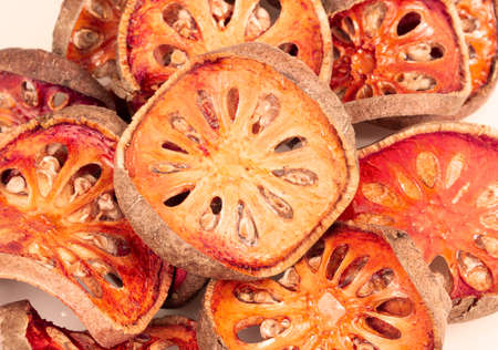 Close up slices of dried bael fruitの写真素材