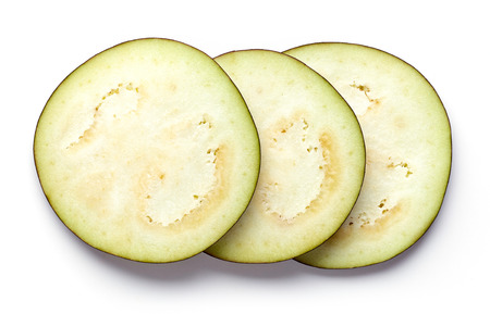 Sliced zucchini isolated on white background, top viewの写真素材