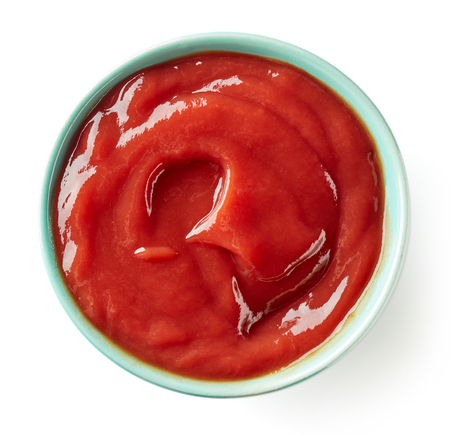 Bowl of ketchup or tomato sauce isolated  on white background, top viewの写真素材