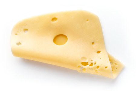 Sliced cheese isolated on white background, top viewの写真素材