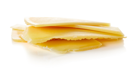 Cheese slices isolated on white backgroundの写真素材