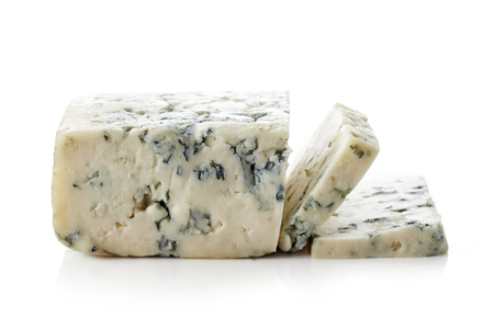 Sliced blue cheese isolated on white backgroundの写真素材