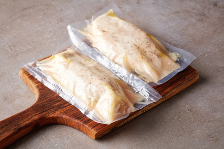 Chicken breast vacuum sealed ready for sous vide cookingの写真素材