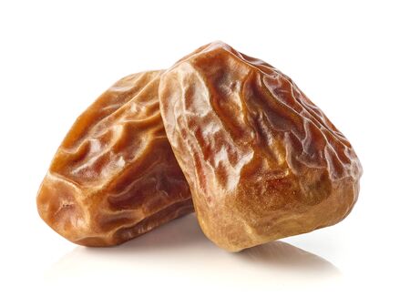 Whole dates isolated on white background