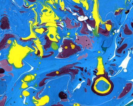 Abstract marbling ebru colorful with blue, purple yellow blots, waves and splashes, handmade...
