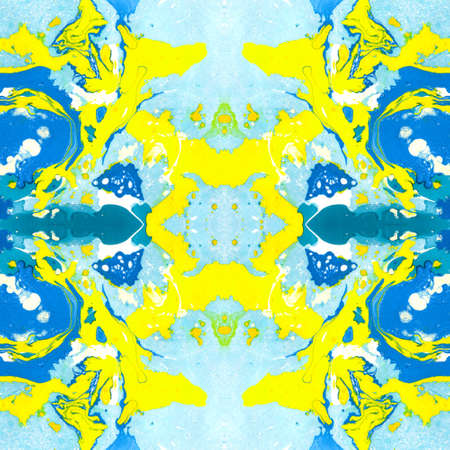Abstract marbling, ebru, ethnic seamless pattern, background - waves and splashes of blue and yellow colors. Colorful kaleidoscope ebru, marbling seamless pattern to be used as an abstract backgroundの写真素材