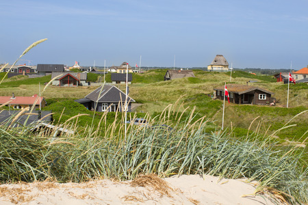 Panoramic view of summer houses at the North Sea shores of Western Jutland, Denmark  Sun is shining and the sky is bright blue のeditorial素材