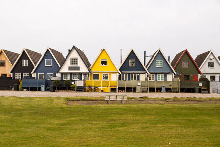 Colorful vacation houses on a cloudy day. Trademarks have been removed.の写真素材