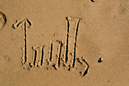 Casual drawing in the sand on a sunny day.の写真素材