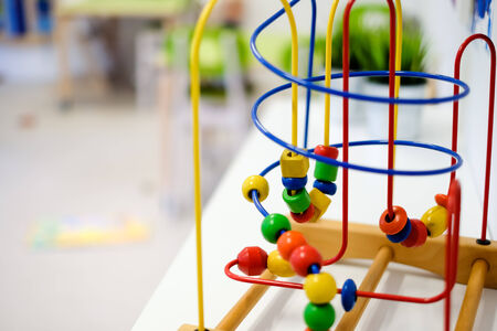 Close-up of classic bead maze with colored beads.の写真素材