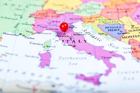 Map of Europe with a round red push pin placed on the city of Florenceの写真素材