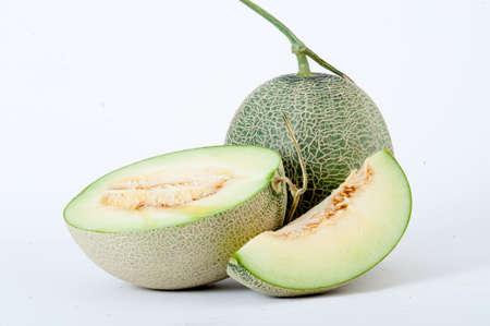 cantaloupe melon,Full and Sliced Cantaloupe Isolated on White Backgroundの写真素材