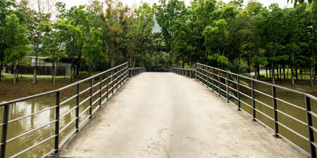 walkway with a metal handrail.