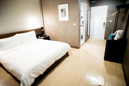 Modern tastefully and simply decorated bedroom of a small hotelのeditorial素材