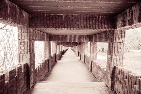stairway in the village,Long Flight of Old Stone Steps Leading up a Dark Alleyway,Old vintage stone stair way.の写真素材