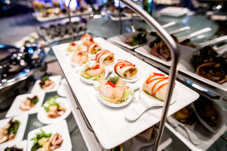 canapes on toothpicks , appetizer, pinchos , spanish food ,delicious finger food,の写真素材