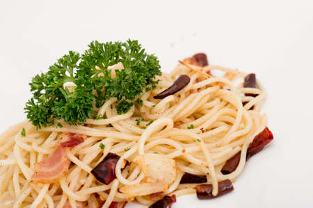 The spaghetti, ham,spaghetti with ham ,onion, chilli and mushroomの写真素材
