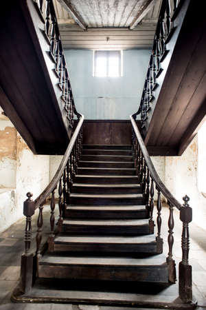 Old abandoned stairs going up to the light. Hope conceptの写真素材