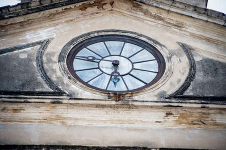 The clock on the old buildingの写真素材
