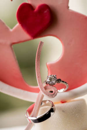 Wedding rings,Wedding ring and icing heart shape cookie for wedding imageの写真素材