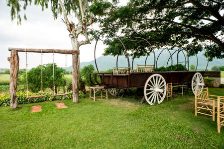 Old white wheeled buckboardの写真素材