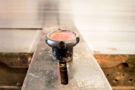 Milling and sawing machine for processing wood,detail of a rusty historic reciprocating saw,