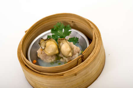 yumcha, dim sum in bamboo steamer, chinese cuisineの写真素材